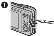 FUJIFILM FINEPIX AX550 - Fixation de la dragonne - 1