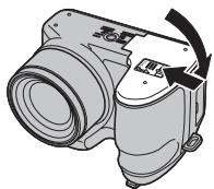 FUJIFILM FINEPIX S2950 - Fermez le couvercle du compartiment des piles. - 1