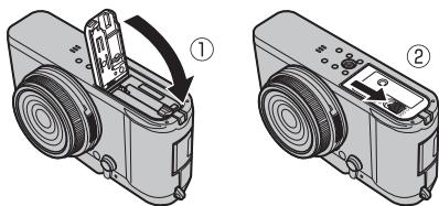 FUJIFILM X100S - Fermez le couvercle du compartment de la batterie. - 1