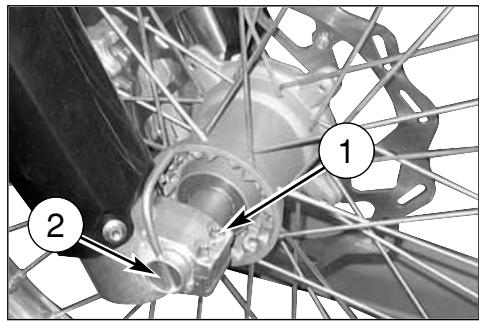 Technical diagram of bicycle wheel assembly with numbered components and labeled parts