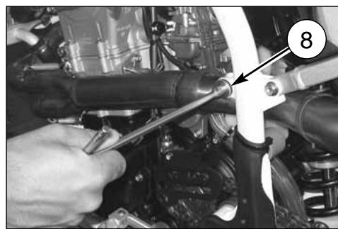 HUSQVARNA TXC 250 - Note*: If silencer or exhaust are difficult to remove, help to slide them apart by tapping gently with a rubber or plastic hammer. - 3