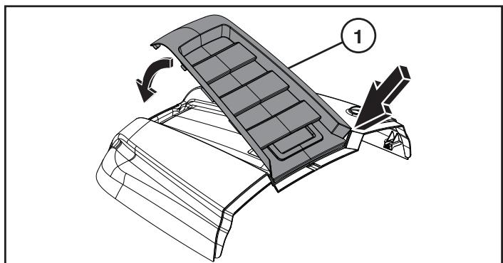 Technical diagram of a vehicle air intake manifold with labeled component 1 and directional arrows indicating airflow or movement.