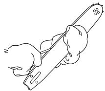 HUSQVARNA CARB III - Contrôle de la lubrification de la chaîne - 3