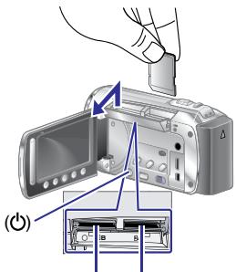 JVC GZ-HM200 - Insérez une carte SD - 1