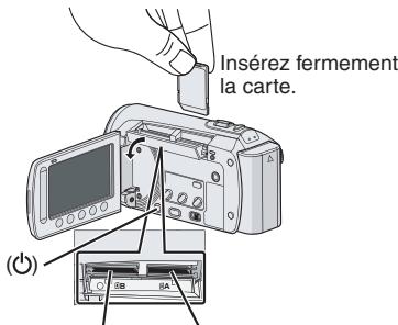 JVC GZ-MS125 - Insérez la carte SD - 1