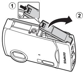 OLYMPUS STYLUS 790 SW - b. Einlegen des Akkus und einer xD-Picture Card (optional) in die Kamera. - 1