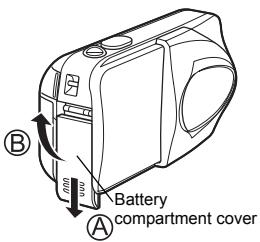 OLYMPUS C-460 ZOOM - Slide the battery compartment cover in the direction of Ⓐ. - 1
