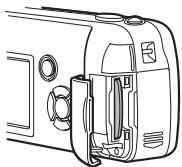 OLYMPUS C-460 ZOOM - Face the card the correct way and insert it into the card slot as shown in the illustration. - 2