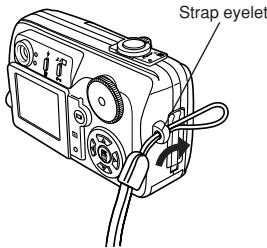 OLYMPUS C-50 ZOOM - Attaching the strap - 1