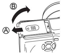 OLYMPUS C-765 UZ - Loading the battery Align the battery as shown and insert it into the battery compartment until the battery is locked in position with the battery lock knob. - 1