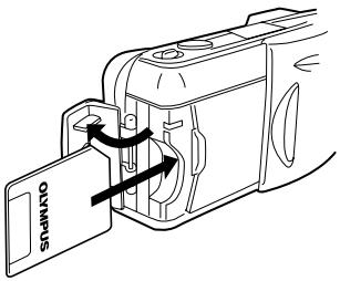 OLYMPUS C-990 ZOOM - Inserting the SmartMedia Card - 1