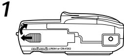 OLYMPUS C-990 ZOOM - Inserting the Batteries - 3