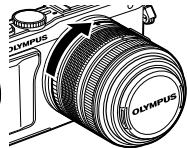 OLYMPUS E-PL5 - Montez un objectif sur l'appareil photo. - 4