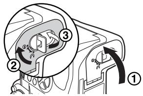 Diagram of a mechanical component with numbered parts and directional arrows indicating motion or force directions.