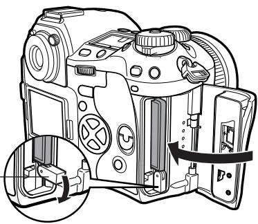OLYMPUS CAMEDIA E-1 - Close the card cover. - 1