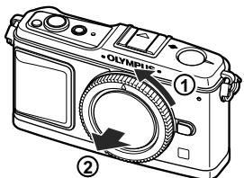 OLYMPUS E-P1 - Enlevez le bouchon avant de l'appareil et le bouchon arrêté de l'objet - 2