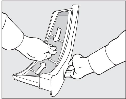 MIELE TMV 840 - Retirer les peluches visibles - 2