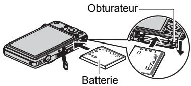 CASIO EX-S10 - Insérez la batterie. - 1