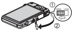 CASIO EX-S10 - Ouvrez le couvercle de batterie. - 1