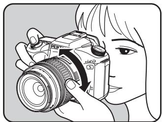 PENTAX ISTDS2 - Tournez la bague du zoom afin de déterminer la taille du sujet. - 1