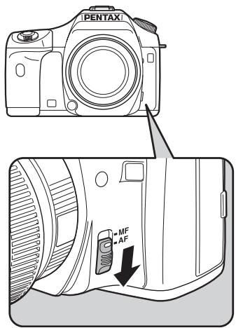 PENTAX K200D - Réglez le curseur du mode de mise au point sur AF. - 1