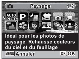 Paysage 1/2 AUTO PICT P WIDE Idéal pour les photos de paysage. Rehausse couleurs du ciel et du feuillage MENU Annuler OK OK