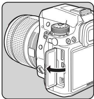 PENTAX K-5 - Utilisation de l'adaptateur secteur (en option) - 1