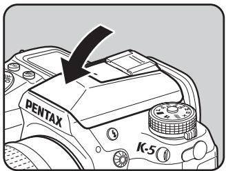 PENTAX K-5 II - Appuyez sur la partie indiquée sur l'illustration pour rétracter le flash incorporé. - 1