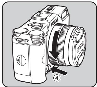 PENTAX Q10 - Pour retirer l'objectif - 1
