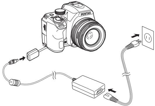 PENTAX K70 - Raccordez le coupleur secteur et l'adaptateur secteur. - 1