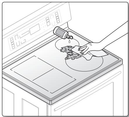 SAMSUNG NE599N1PBSR/AC - Removing burned-on residue - 1