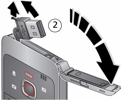 KODAK PLAYFULL ZE2 - Mise en route de votre caméscope Ouverture du compartment de charge/ USB - 2