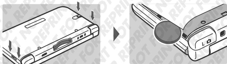 NINTENDO 3DS XL - Liberez les quatre fermoirs. - 1