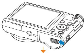 SAMSUNG WB150F - Insertion de la batterie et de la carte mémoire - 1