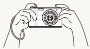 SAMSUNG ES90 - Tenez correctement votre l'appareil photo - 1
