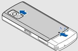 SAMSUNG L700 - Installer la carte SIM ou USIM et la batterie - 1