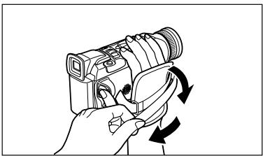 CANON MVX100I - Mentre con la mano destra mantenete la videocamera, con la sinistra regolatene la cinghia. - 1