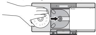 PIONEER XSMC00 - Plaats de schijf. - 1