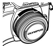 OLYMPUS OM-D E-M10 - Montez un objectif sur l'appareil photo. - 4