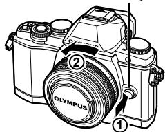 OLYMPUS OM-D E-M10 - Retrait de l'objectif de l'appareil photo - 1