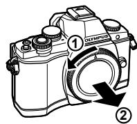 OLYMPUS OM-D E-M10 - Montez un objectif sur l'appareil photo. - 2