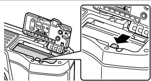 OLYMPUS OM-D E-M10 - Retrait de la batterie - 1