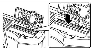 OLYMPUS OM-D E-M10 - Retrait de la carte - 1
