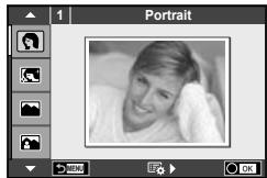 OLYMPUS OM-D E-M10 - Faites tourner la molette de mode sur SCN. - 1