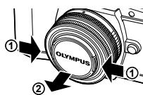 OLYMPUS OM-D E-M10 - Retirez le bouchon de I'objet. - 1