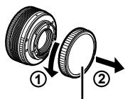 OLYMPUS OM-D E-M10 - Montez un objectif sur l'appareil photo. - 1