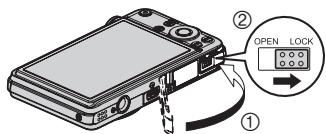 CASIO EXILIM 12.1 - Fermez le couvercle de batterie. - 1