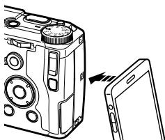 RICOH GR-II - Contact avec un dispositif de communication - 1