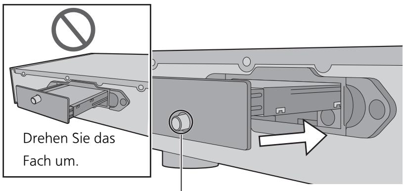 PANASONIC STG30LE - Schieben Sie das Speicherfach in dieses Gerät ein und bringen Sie die Befestigungsschraube wieder an. - 1