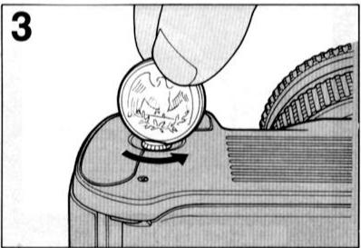 NIKON F-801S - MISE EN PLACE DES PILES - 1